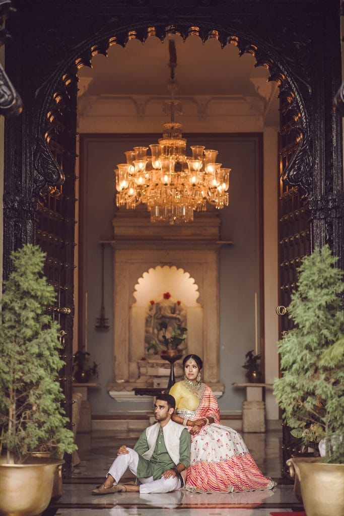 Couple relaxing together at a heritage property in Udaipur before their destination wedding — Desert Pearl Weddings