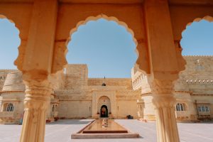 Suryagarh Jaisalmer fort exterior with ornate sandstone arches – luxury destination wedding venue in Rajasthan