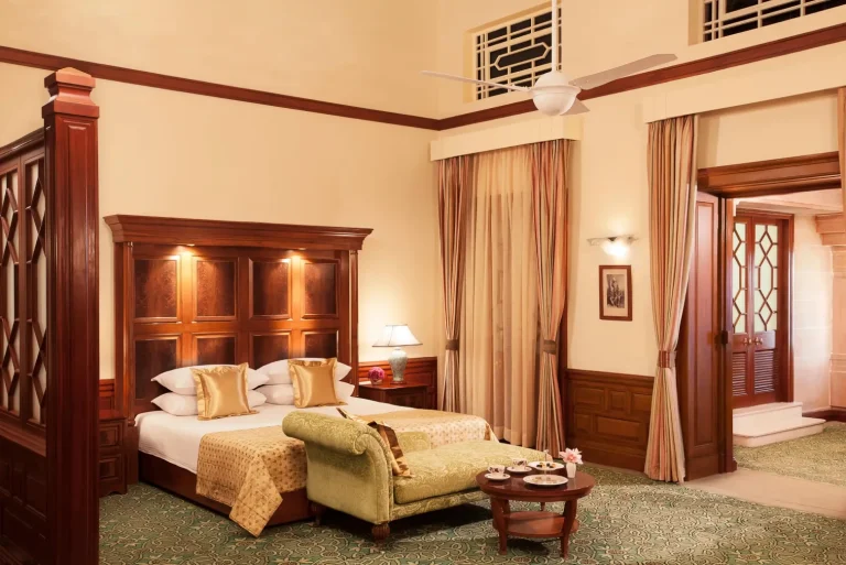 Opulent heritage suite bedroom at Umaid Bhawan Palace Jodhpur with original Art Deco furnishings, providing a truly royal experience for wedding couples