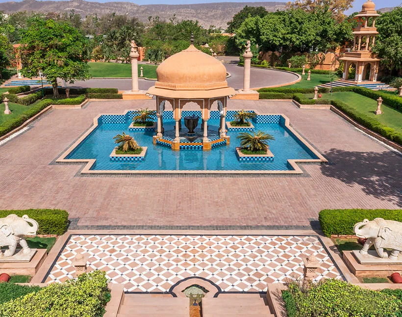 Domed pavilion and reflection pool aerial view at The Oberoi Rajvilas, Jaipur
