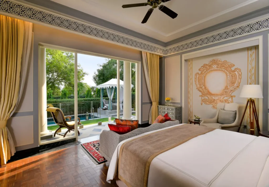 Villa bedroom with private pool and garden view at Raffles Udaipur