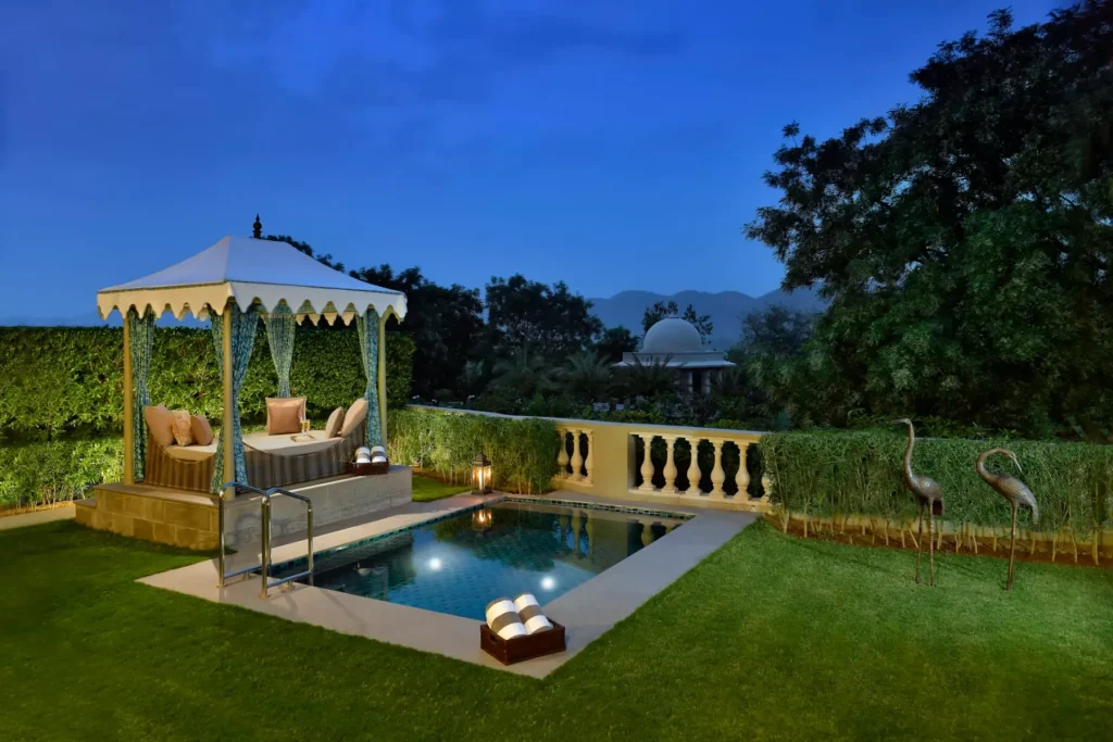 Villa private plunge pool with garden pavilion at twilight at Raffles Udaipur