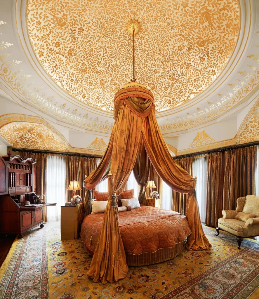Gold-domed royal suite with canopy bed at Rambagh Palace, Jaipur