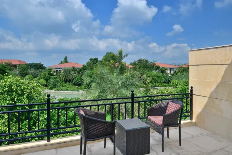 Serene morning view from the balcony at The Westin Resort & Spa Pushkar overlooking the Aravalli hills, a peaceful retreat for wedding couples
