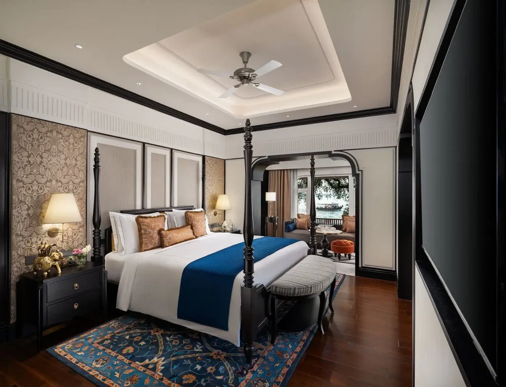 Four-poster king bedroom with harbour view at Taj Malabar Presidential Suite Kochi
