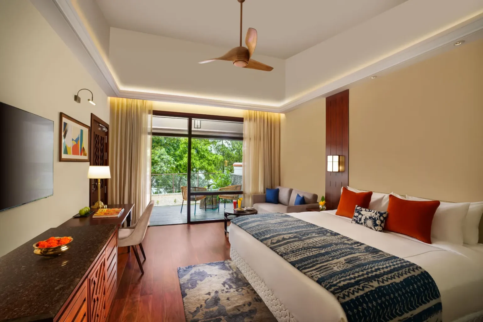 Guest room with private terrace and garden view at Taj Wayanad Resort & Spa