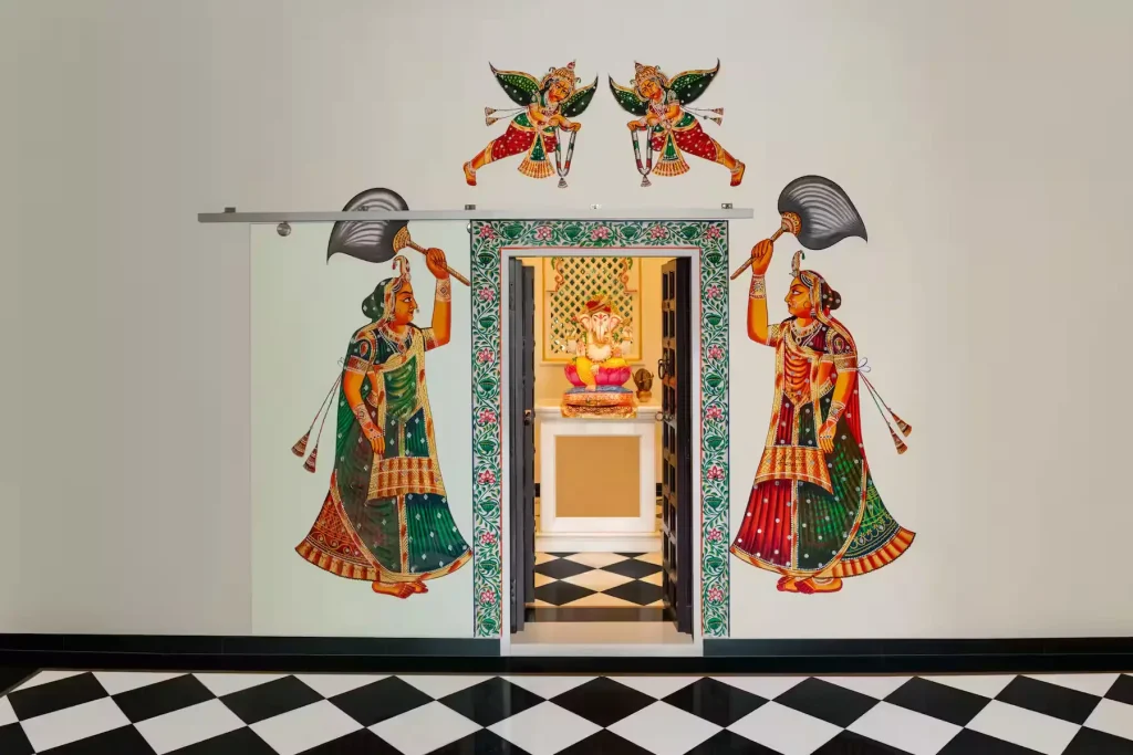 Ganesh prayer room with traditional Rajasthani mural art at Wyndham Grand Udaipur Fatehsagar Lake