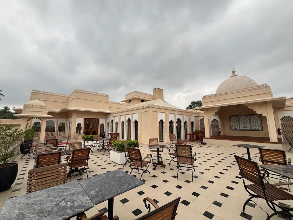 Open-air terrace restaurant with checker marble floor and domed pavilion at Trident Udaipur
