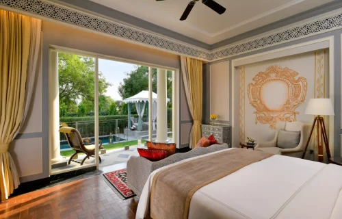 Villa bedroom with private pool and garden view at Raffles Udaipur