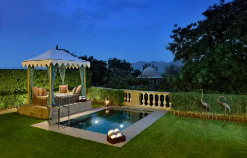 Villa private plunge pool with garden pavilion at twilight at Raffles Udaipur