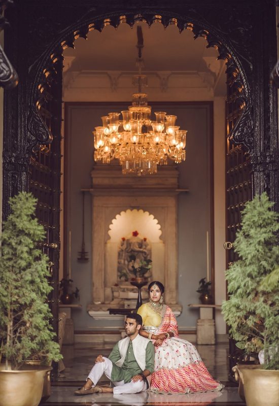Couples are sitting at heritage property and create some memorable time together | desertpearlweddings